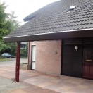 Carport met doorlopende pannendak